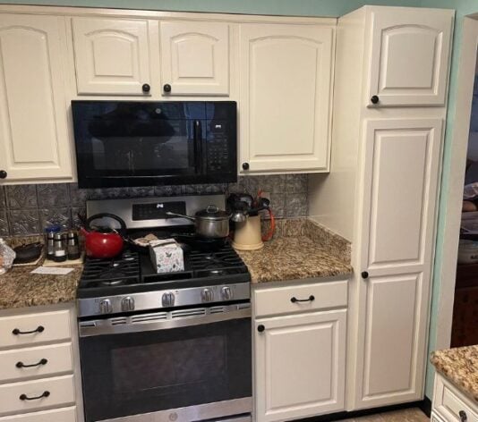 homeowner kitchen with freshly painted cabinets
