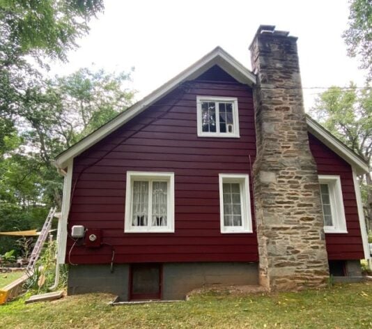 exterior view of homeowner house painted red