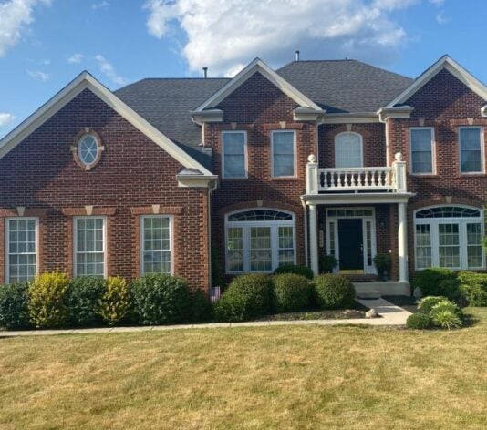 homeowner house with freshly painted trim