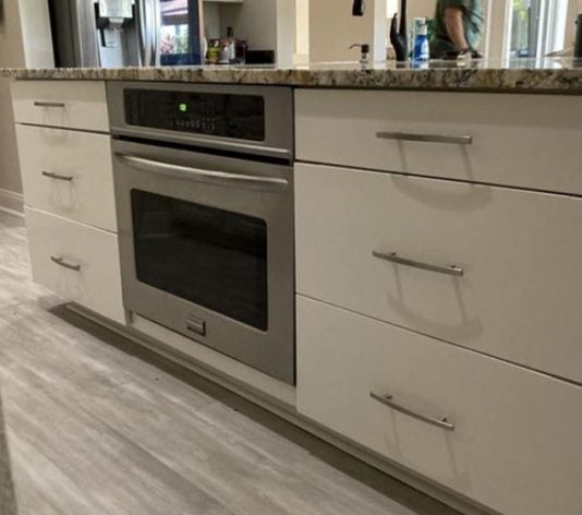 Kitchen island cabinets freshly painted after