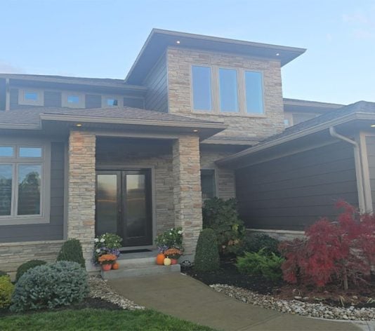 front view of residential homeowner house with freshly painted Emerald Rain Fresh Exterior Acrylic Paint