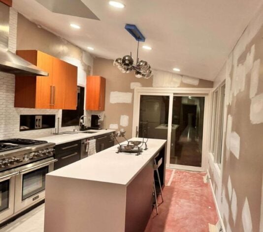 resident kitchen in the process of getting painted