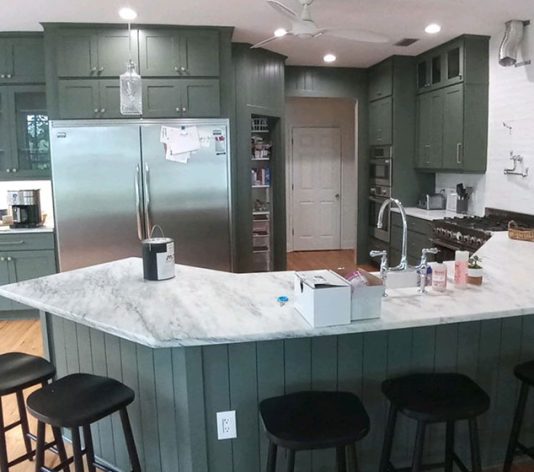 green kitchen shiplap and cabinet painting